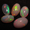 6x10 - 7x11.5 mm oval - Ethiopian Opal - really - tope grade high quality CABOCHON - oval shape - each pcs - have amazing - beautifull - flashy fire all around in the stone -5 pcs - approx -- STUNNING QUALITY - VERY VERY RARE